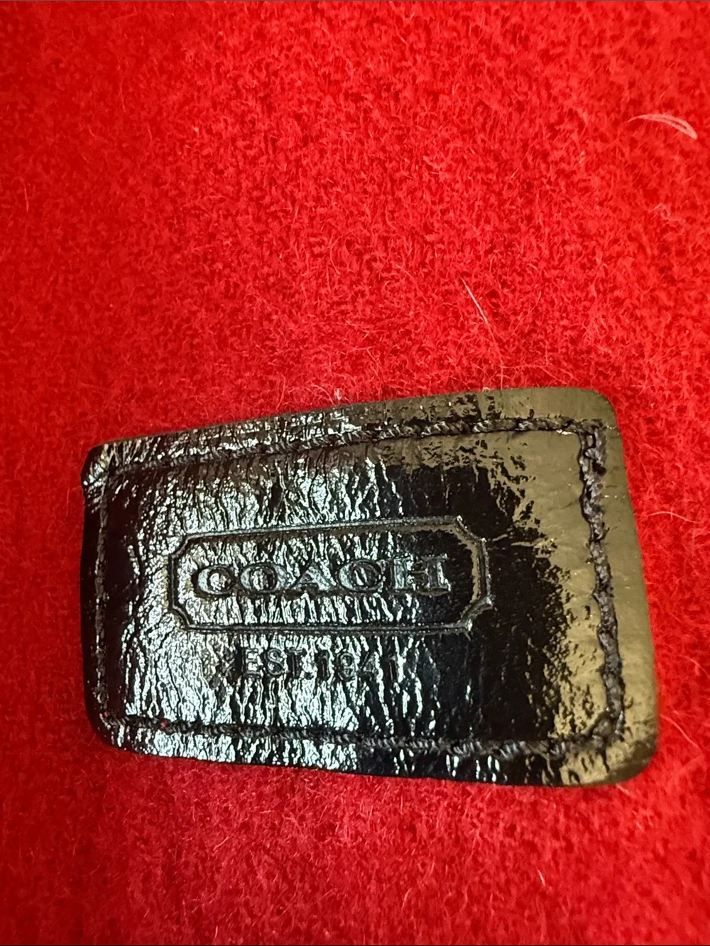 Coach Red Wool Fringe Scarf with Black Leather Logo Patch | Classic Winter Wrap